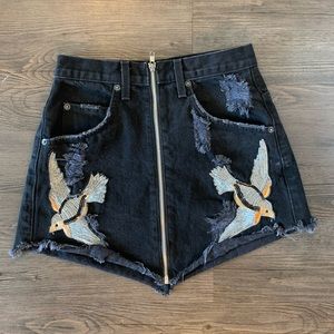 Embellished black denim skirt